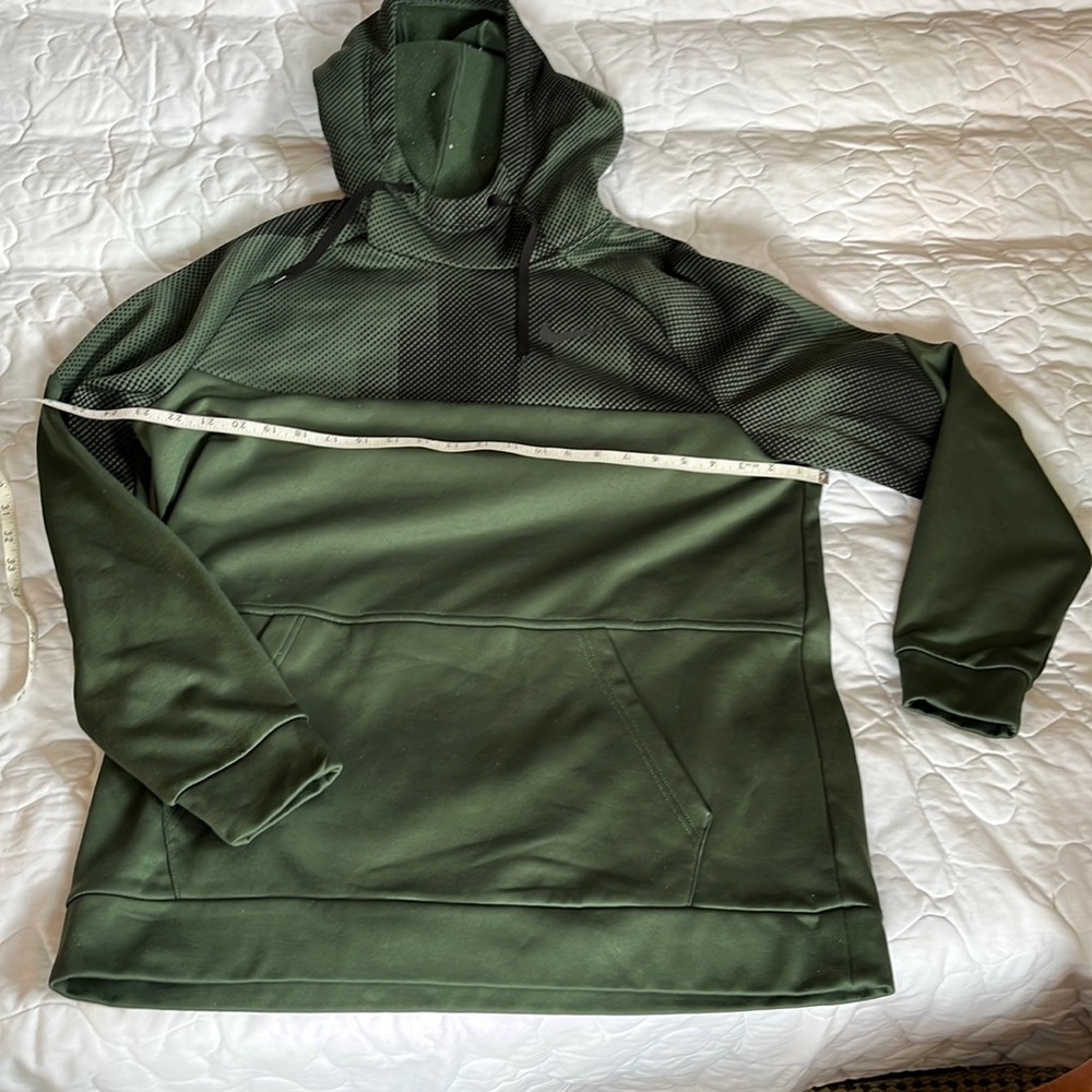 Green and black men’s hoodie Nike
